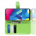 Флип чехол книжка с кошельком подставкой отделениями для карт и магнитной застежкой для Samsung Galaxy M10 Зеленый